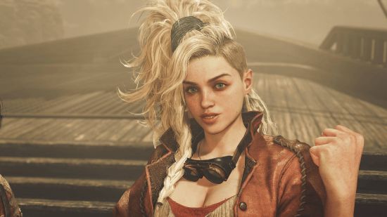 Monster Hunter Wilds release date: Gemma is a blonde woman with a pair of sand googles around her neck.